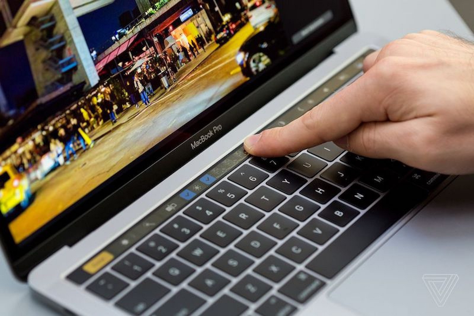 http://www.macrumors.com/2016/11/14/macbook-pro-touch-bar-review-roundup/